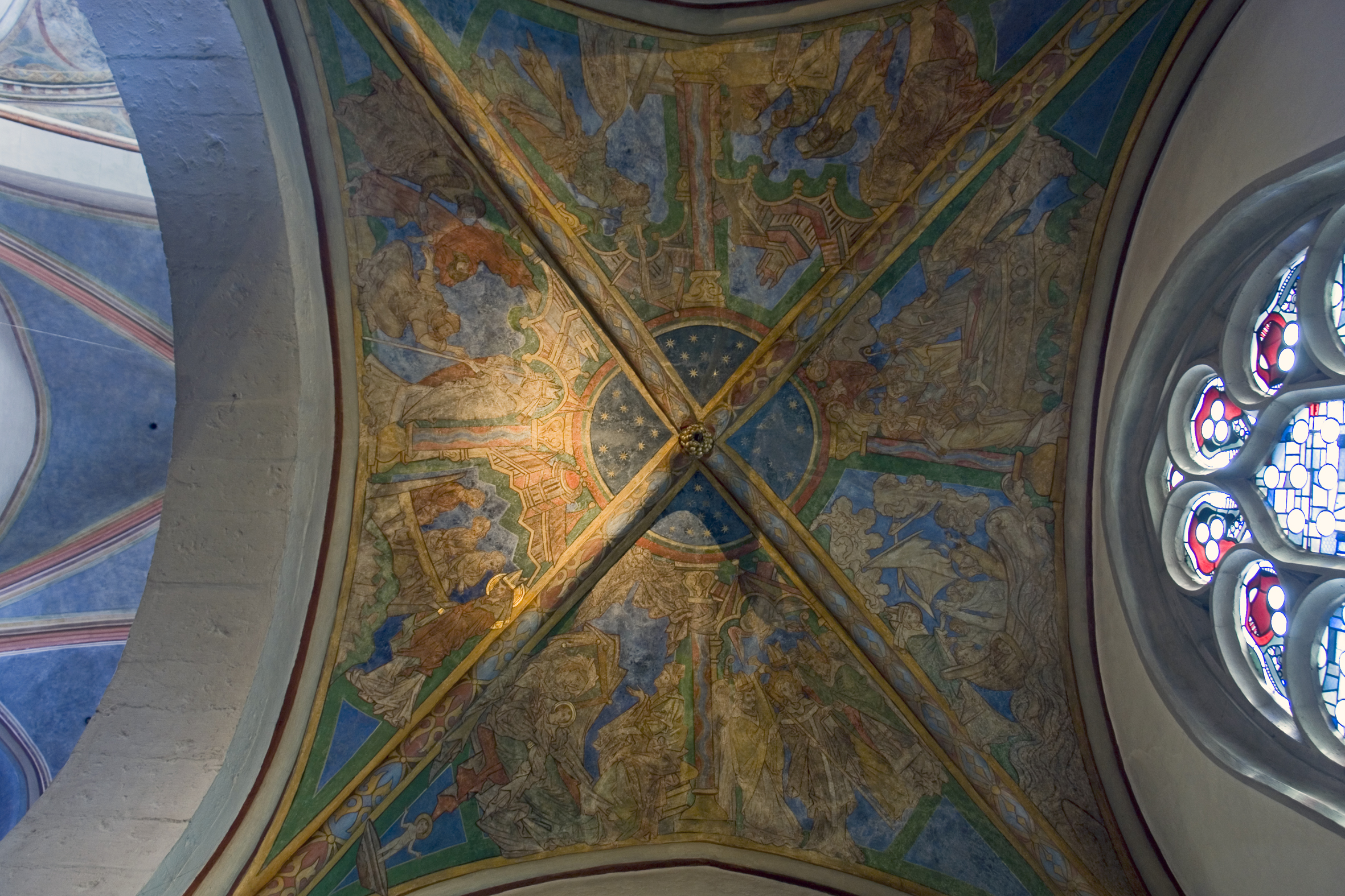 Fresko zu Ehren des Heiligen Nikolaus in St. Maria Lyskirchen. Auf der rechten Seite, etwa zwischen drei und fünf Uhr, rettet Nikolaus Seeleute in Seenot und wird somit zum Schutzpatron der Seefahrer und Binnenschiffer. Bild: Hans Peter Schaefer, http://www.reserv-a-rt.de, CC BY-SA 3.0 via Wikimedia Commons